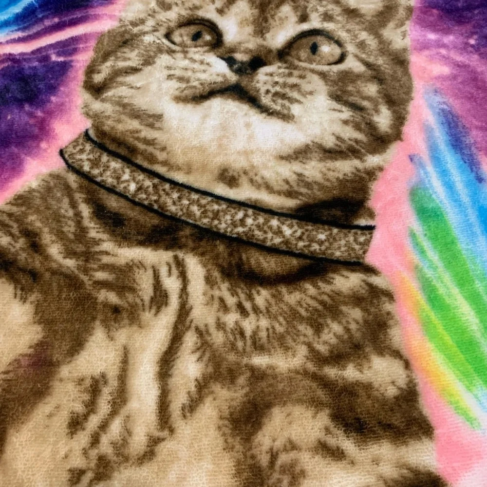 Throw blanket with cat on it
